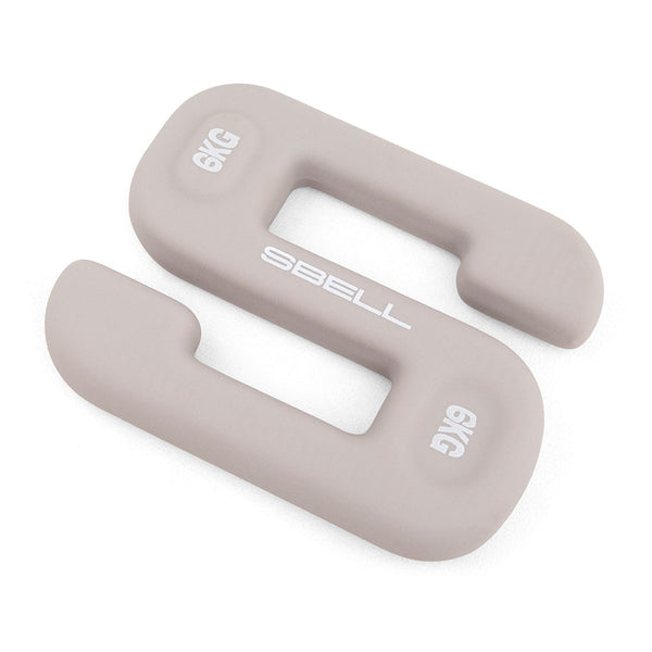 A gray S-shaped dumbbell with the brand name "No Sync To Channel Engine" and labeled "SBELL Grey 6kg" is placed on a white background, ideal for free weight training in a commercial gym.