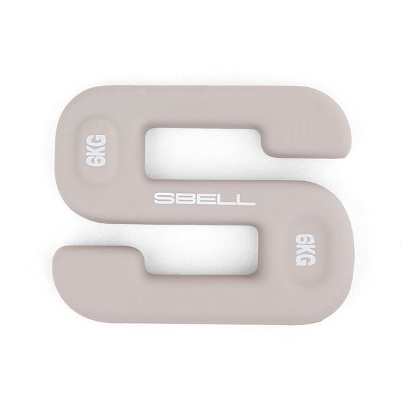 A beige, S-shaped dumbbell weighing 6 kilograms, ideal for free weight training in your home gym, features the "No Sync To Channel Engine" brand with "SBELL Intermediate pack" elegantly printed in white across its center.