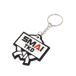 The SMAI Taekwondo Keyring - Rubber by SMAI features a metal ring, a rubber tag with bold "SMAI TKD" in black and red, and a white martial arts belt illustration below the text.