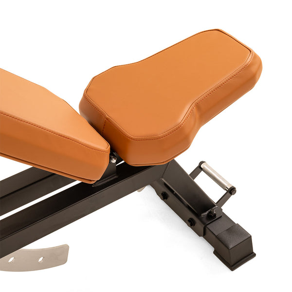 Close-up of the SMAI Commercial Adjustable Bench - Tan, featuring an orange-brown padded seat and backrest with a black metal frame and support bar, designed for gym or fitness use.