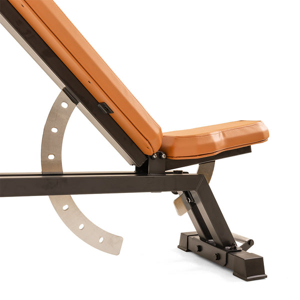 The SMAI Commercial Adjustable Bench - Tan features tan padding, a black metal frame, and an adjustable backrest with a semi-circular bracket—ideal for commercial weight bench setups.