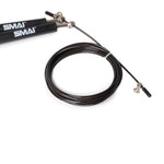 Close-up of a coiled black plastic speed rope with metal handles featuring ball bearings, branded "SMAI," set against a white background.