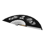 The SMAI Tai Chi Fan - Steel features black fabric with white dragon art, a yin-yang symbol, Chinese characters, and light ribs. Its ornate design is ideal for Tai Chi training or performances.