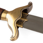 Close-up of the SMAI Tai Chi Sword Brass Fitting Ying Yang, featuring a curved brass handguard, wooden handle, and Chinese characters engraved near the base of its spring steel blade.