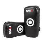 The SMAI Muay Thai Pad - Syntec Black (Pair) features black synthetic leather with white target circles and SMAI’s red and white logo, shown both upright and flat—ideal for martial arts training.