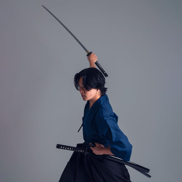 Katana - High Carbon Black / Blue Man swinging