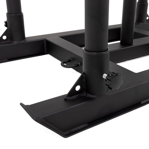 Close-up of the SMAI Tower Gym Sled - 4 Handles, featuring a black metal base with tubular supports, rectangular frame, and adjustment knob—ideal for push and pull sled functional training.
