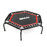 The Rebounder Mini Trampoline Pack by SMAI features a small hexagonal design, black frame with red accents, six sturdy legs, elastic bungee cords around the frame, and "SMAI" printed in white on the jumping surface.