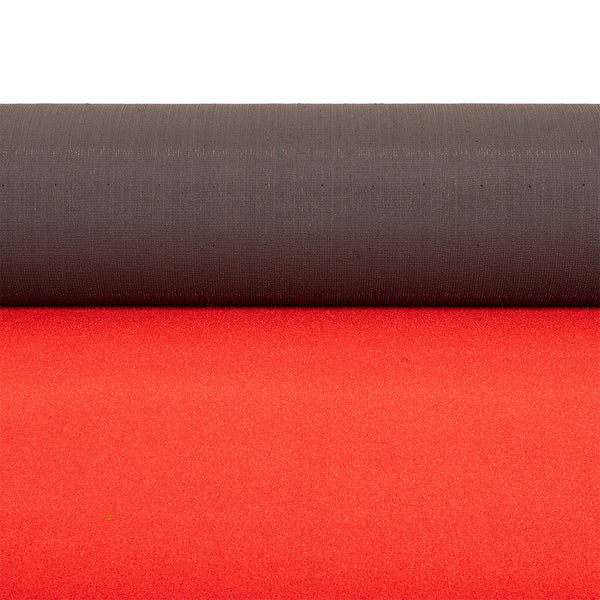 A close-up of a roll of dark brown fabric above a flat layer of SMAI Red Gym Turf Sled Track (2m x 12m), both showing visible texture reminiscent of durable commercial gym flooring.