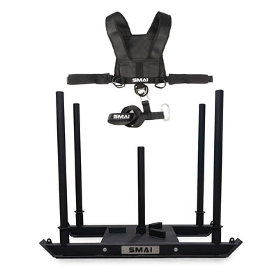 The SMAI Tower Gym Sled 3.0 With Sled Harness is a black sled featuring four vertical posts, shoulder straps, and a "SMAI" belt—ideal for strength, resistance, and sprint training.