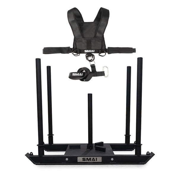 The SMAI Tower Gym Sled 3.0 With Sled Harness is a black sled featuring four vertical posts, shoulder straps, and a "SMAI" belt—ideal for strength, resistance, and sprint training.