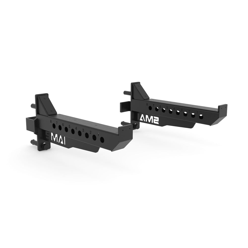 Two black metal adjustable SMAI Vanta Series Safety Spotting Arms (Pair) with multiple holes and "AM1" and "AM2" in white on each, shown diagonally on a white background—perfect for barbell protection or pairing with Vanta equipment.