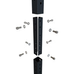 Exploded view of the X-Frame - Upright Extension - 3ft, a black metal bracket system with multiple holes, scattered bolts, washers, and nuts. The central piece resembles an upright extension post split into two sections for assembly, ideal for supporting gym rings or climbing ropes.