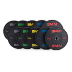 A stylish arrangement of the Olympic Bumper Plates Set - 150kg Mixed HD, perfect for any fitness enthusiast. Each black bumper plate is marked with vivid weight colors: 5kg (red), 10kg (green), 15kg (yellow), 20kg (blue), and 25kg (red). The "Sale Item" brand name stands out in bold red, making this collection an essential addition to your lifting gear.