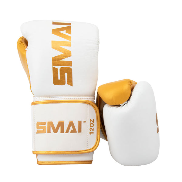 ProGuard White/Gold Boxing Glove Right glove up right while the other lying down on its side behind