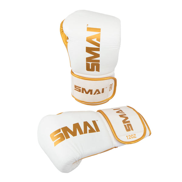 ProGuard White/Gold Boxing Glove right glove up right while the left is lying palm facing down infront