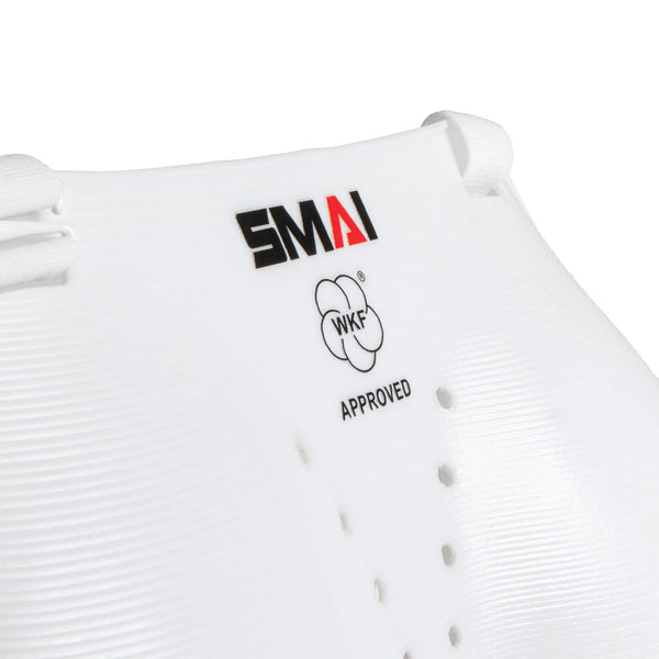Close-up of the SMAI WKF Approved Female Breast Guard Insert, featuring the "SMAI" logo, WKF approval symbol, and visible laces and vent holes.