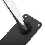 A close-up of a metal leg attached to the rectangular black mounting plate from the SMAI Wall mounted Bumper Plate Storage with Chrome Pegs, featuring four screw holes for secure gym storage installation.