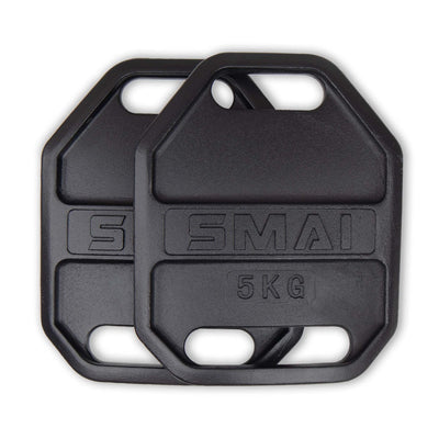Two SMAI Weight Vest Plate Pair - 5kg For Vest Black, each weighing 5 kg, with four handle slots and embossed branding. These plates, designed to boost workout intensity, feature a hexagonal shape with rounded corners.