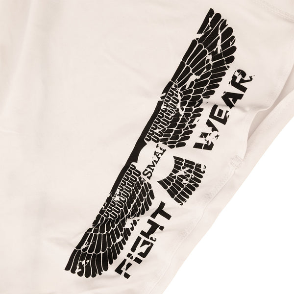 A black wing design and the words "SNAKE WEAR" are printed on white MMA Shorts - Aussie by SMAI, with part of the wing extending along the fabric—perfect for fans of Fight Wear style.