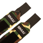 SMAI Wrist Support Wraps - Weightlifting: Camouflage-patterned fabric wrist wraps with black straps, velcro, and a black "SMAI" patch—perfect for added wrist support and protection during workouts.