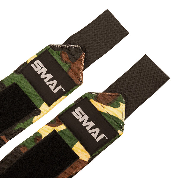 SMAI Wrist Support Wraps - Weightlifting: Camouflage-patterned fabric wrist wraps with black straps, velcro, and a black "SMAI" patch—perfect for added wrist support and protection during workouts.