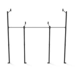 Introducing the Wall Mounted Rig - 2 Squat Cell with Bridge - X-Frame by No Sync To Channel Engine, a freestanding pull-up bar designed in sleek black and crafted from durable steel tubing. This modular piece features an adjustable horizontal bar supported by vertical posts, each equipped with multiple holes for customization to fit any workout setting, be it at home or in the gym. The structure is elegantly displayed against a plain white background.