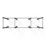 Overhead view of the Rig - 4 Squat Cell with Bridge by No Sync To Channel Engine, featuring a minimalist black metal frame crafted from steel tubing with four rectangular sections. This modular design is sleek and modern, ideal for shelving or support, set against a plain white background.