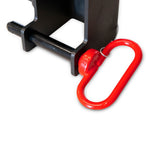 A black metal bracket featuring a cylindrical pin securely holds a red D-ring shackle at the bottom, highlighting its modular design against a white backdrop. Ideal for barbell safety, the X-Frame - Cage Spotting Rail (Pair) by No Sync To Channel Engine can seamlessly integrate into your squat rack setup.