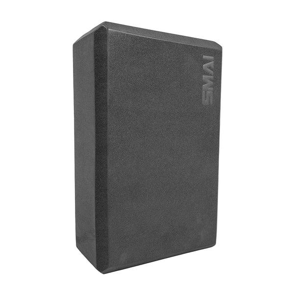 The SMAI Yoga Block - Black is a high-density foam block with slightly rounded edges, embossed with "SUMI" on the top right—a must-have pilates accessory for added support and stability.
