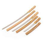 The SMAI Shirasaya 3pc Sword & Stand set displays three Japanese blades with wooden handles and scabbards, each inscribed with Japanese characters, diagonally arranged by size on a white background.