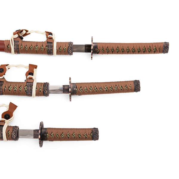 The SMAI Samurai 3pc Sword & Stand - Brown set features katana, wakizashi, and tanto swords with brown and green-wrapped handles and ornate hilts, elegantly displayed on a white background.