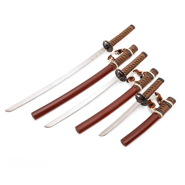 The SMAI Samurai 3pc Sword & Stand - Brown features three Japanese swords with brown sheaths and detailed hilts, elegantly displayed in descending size order on a white background.