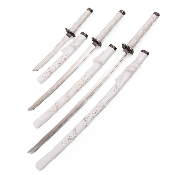 The SMAI White Samurai 3pc Sword & Stand set displays three traditional Japanese swords with white handles and detailed engraving on the blades and scabbards, elegantly arranged together.