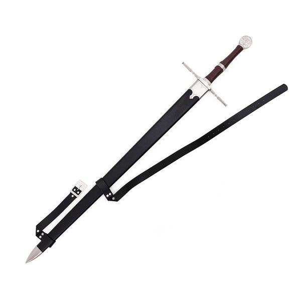 The SMAI Medieval Broadsword - Witch Hunter features a silver crossguard and pommel, brown handle, and black leather scabbard with straps and buckles for waist wear—perfect as a display sword.