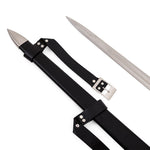 The SMAI Medieval Broadsword - Witch Hunter features a sharp stainless steel blade and comes with a black leather scabbard adorned with silver accents, buckle strap, and pointed metal tip—ideal as an impressive display sword.