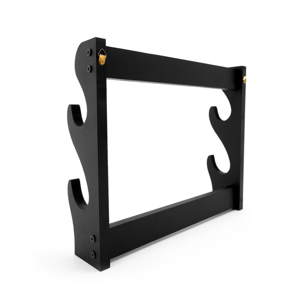 The SMAI Double Sword Display Wall Mounted features a black wooden frame with curved side supports and gold hardware, designed to hold 2 swords horizontally. The mount’s sleek look contrasts nicely against a plain white background.