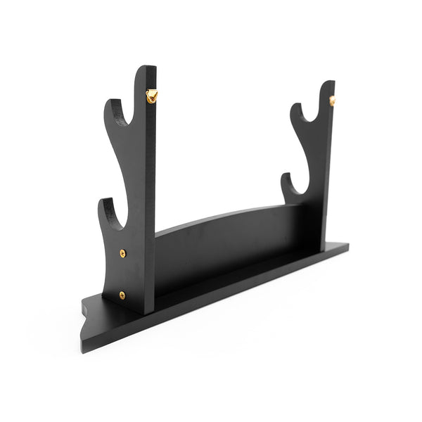 The SMAI Double Sword Display Stand features a sleek black finish, two upright holders, and gold-colored screws for securely displaying swords horizontally on a flat base. Shown on a plain white background.