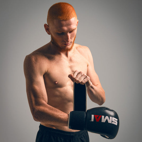 Zeke Campbell wearing the SMAI Essentials Boxing Glove 3
