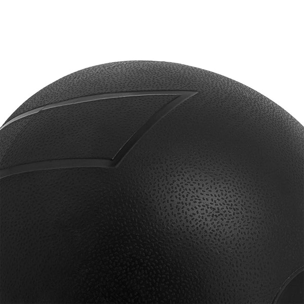 Close-up of the SMAI "The Yard - Slam Ball 50kg," showing its durable rubber build with curved indented lines and a pebbled texture, designed for intense sand-filled training.