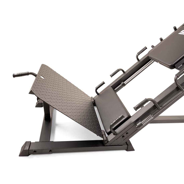 Side view of a SMAI Leg Press / Hack Squat Combo - Light Commercial featuring a diamond-plate steel footplate and padded back support.