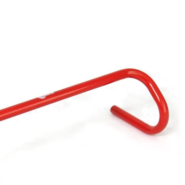 A red, smoothly finished curved metal hook displayed against a simple white background reflects the sleek design of the **Steel Agility Hurdle - 15cm Red** by *Sale Item*, which is crucial for honing speed and coordination.