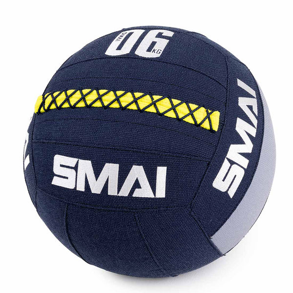 The SMAI Wall Balls - Hybrid Range in navy blue features durable aramid fibre, white SMAI branding, a yellow stitched detail, and "06 KG" marking—an essential gym equipment item.