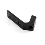 The SMAI Fixed Barbell Rack Spare J-Hook Replacement Part is a black plastic L-shaped bracket, featuring three circular holes on one side and an angled edge. Made of heavy-duty polyurethane for durability, it sits on a pristine white surface.