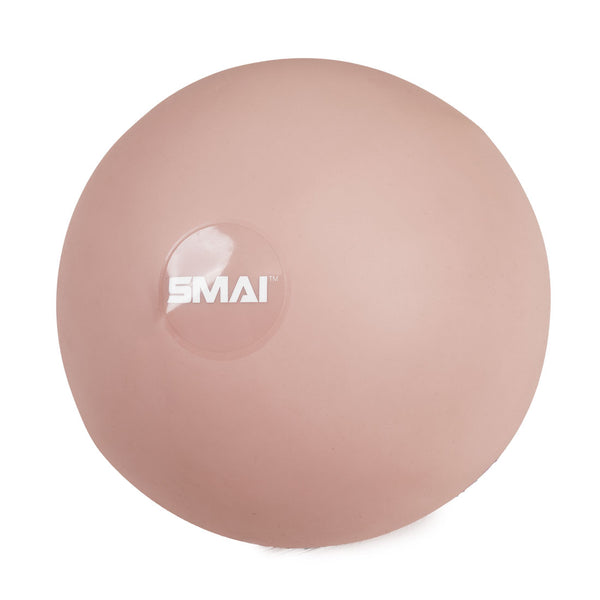 The SMAI Pilates Ball - Clay Pink features a shiny finish and white "SMAI" logo, ideal for core strengthening or any Pilates workout. Shown from above on a white background.