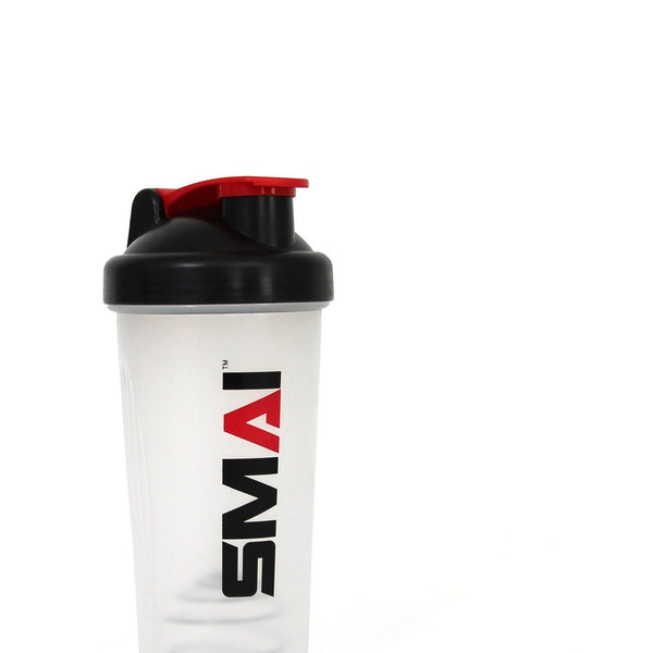 Introducing the SMAI Protein Drink Shaker, crafted from clear plastic and designed with a sleek black lid and red flip-top cap. The word "SMAI" is boldly printed vertically in black and red on the bottle, which features an integrated mixer for effortless blending. Ideal for gym enthusiasts. Set against a plain white background.