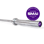 Enhance your Olympic lifting setup with the silver 20-kilogram barbell, featuring purple Sale Item branding on the end cap and a remarkable capacity of 1500 lb. The background showcases a clean white design with a purple circle highlighting the website URL and "Established 1985.