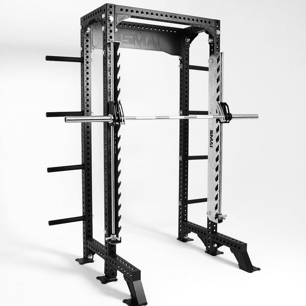 The Smith Machine Insert - Vanta Series by SMAI, in sleek black and silver, features a barbell with adjustable safety bars and weight plate storage pegs. This design ensures top-notch weightlifting safety against a plain white background.