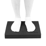 Black SMAI Balance pad block man standing