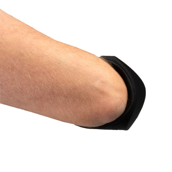 Arm wearing black martial arts forearm guard Elbow